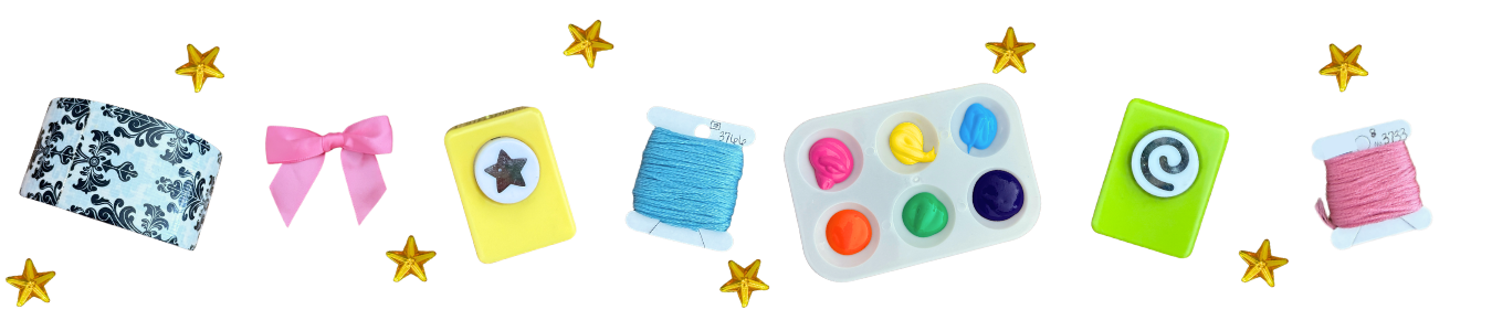 Various scattered craft supplies and yellos star gems